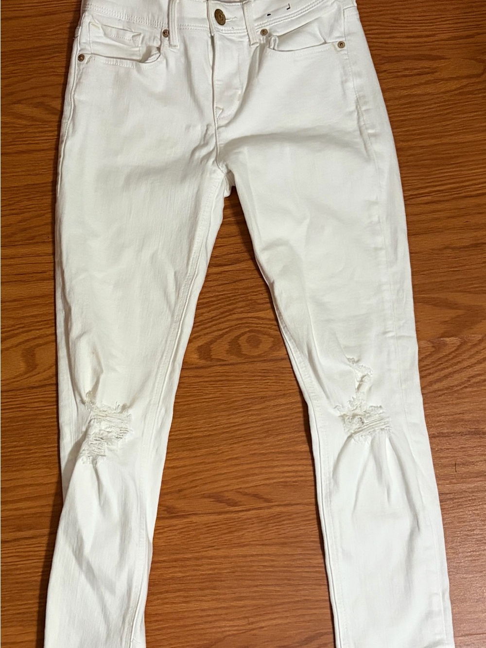 Express White Skinny Jeans with Knee Distressing